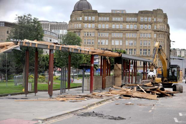 Bus shelter on Hall Ings being taken down in June 2024 (Image: Newsquest, Mike Simmonds)