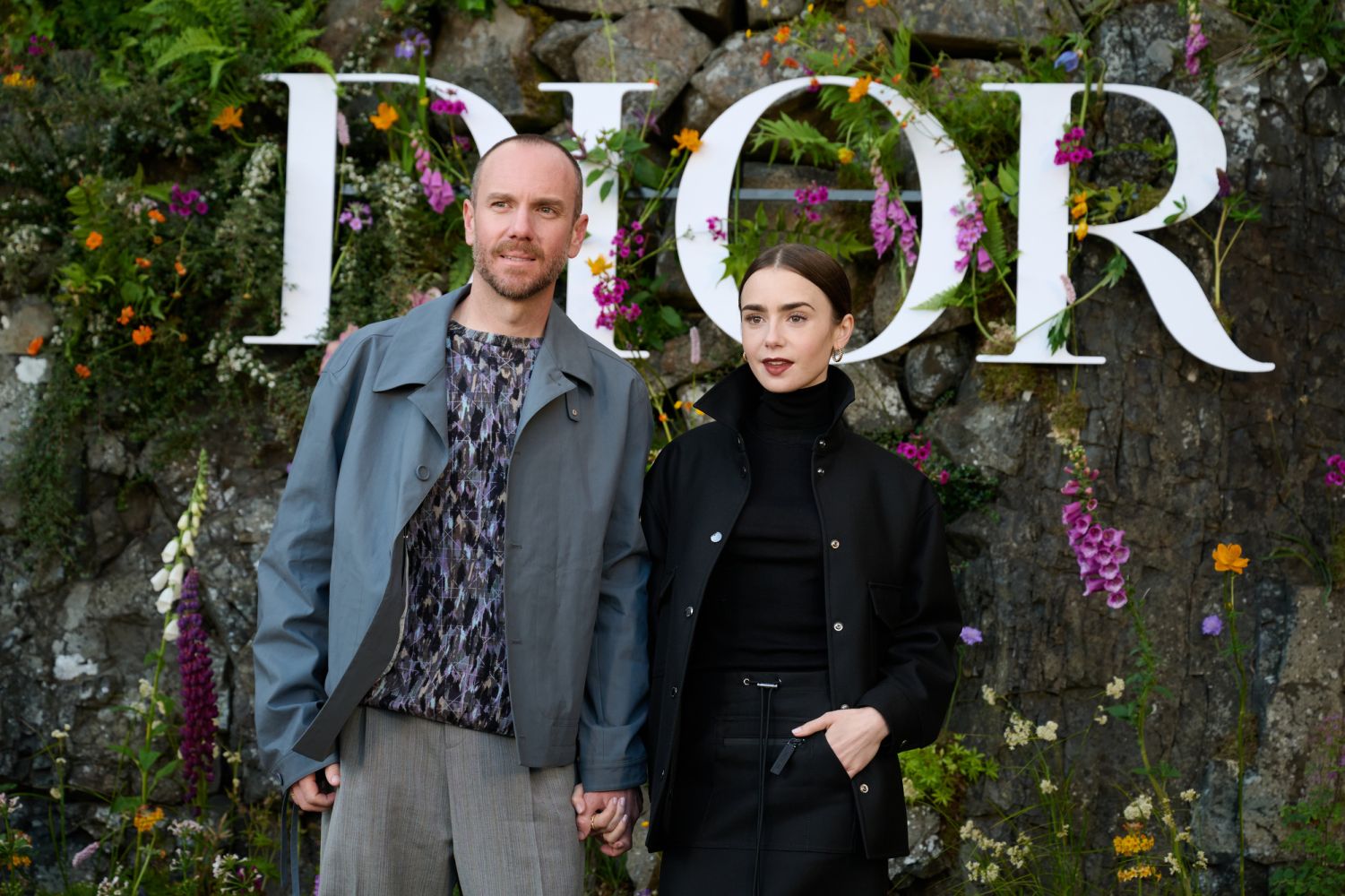 <p>Charlie McDowell and Lily Collins at the Dior Cruise 2025 Show</p>