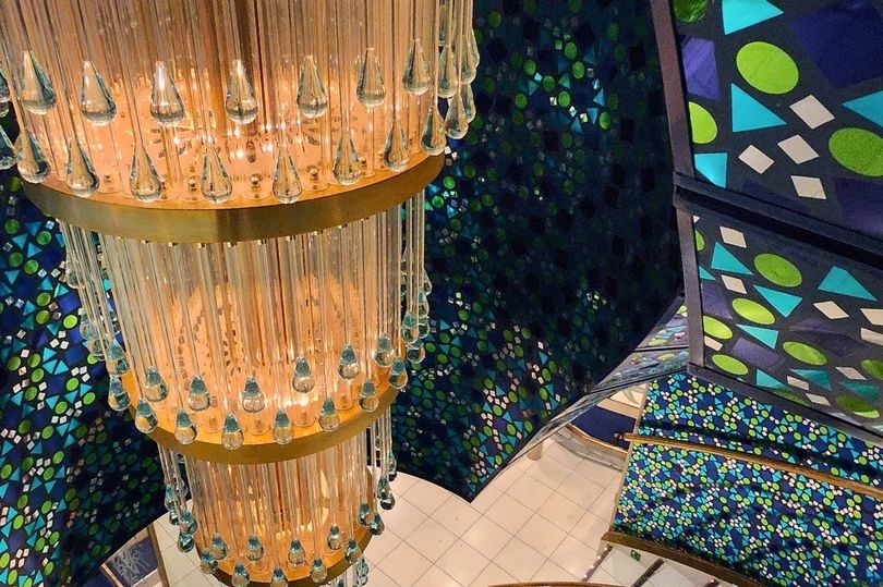 The Flip Flop Atrium will be the heart of the ship, featuring multi-story floating margarita glass chandeliers.