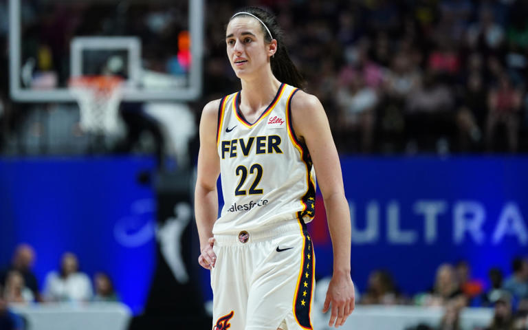 Indiana Fever guard Caitlin Clark (22) reacts after her third foul against the Connecticut Sun in the second quarter at Mohegan Sun Arena. © David Butler II-USA TODAY Sports