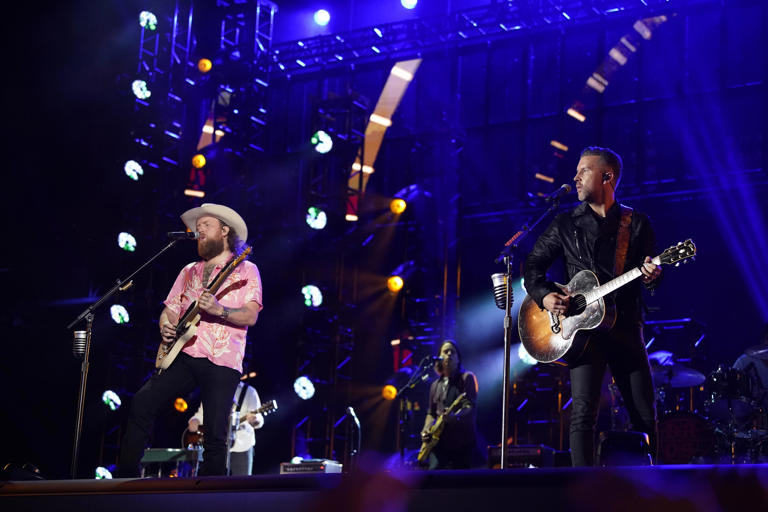 Brothers Osborne perform during CMA Fest at Nissan Stadium in Nashville, Tenn., Sunday, June 9, 2024.