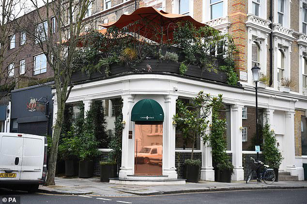 Casa Cruz, where Taylor Swift was spotted dining, is described as an 'intimate, warm and elegant neighbourhood restaurant tucked into the leafy streets of London's Notting Hill'