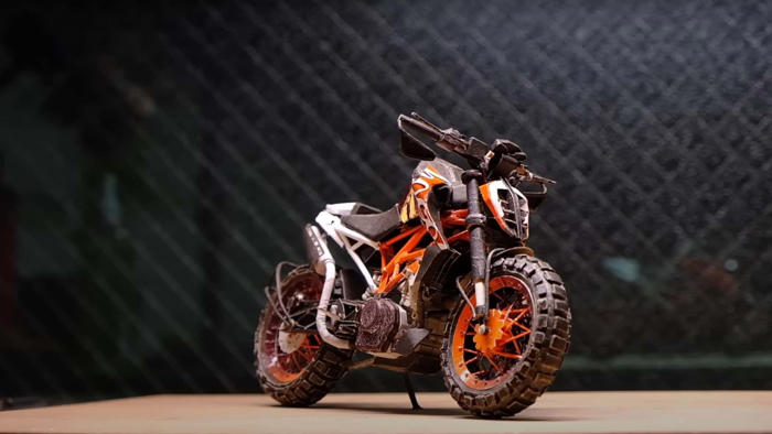 this mind-blowing miniature motorcycle is made entirely from paper