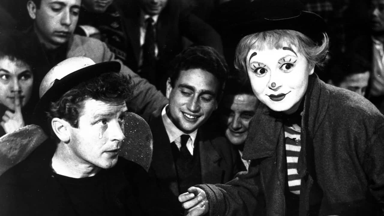 <p>After years of working as a screenwriter and directing a few romantic comedies previously, Federico Fellini began attracting attention on his own merits with the poetic <em>La Strada</em>.</p><p>Following a traveling strongman and the girl companion he mistreats so callously, <em>La Strada</em> broke from the earlier neorealist style that Fellini steeped himself in and retreated to an earlier stylistic flourish more suited to the burgeoning filmmaker. Giulietta Masina, one of the most expressive actresses of postwar Italian cinema, stars as Gelsomina, perfectly capturing the character’s simple-mindedness and gentle disposition.</p><p><em>La Strada</em> generated intense scrutiny upon its premiere, with a notable episode involving future filmmaker Franco Zeffirelli at the Venice Film Festival. Yet the film continued to earn acclaim as time passed, ultimately becoming a meditation on the trials and tribulations of life itself, both its whimsical highs and tragic lows.</p>