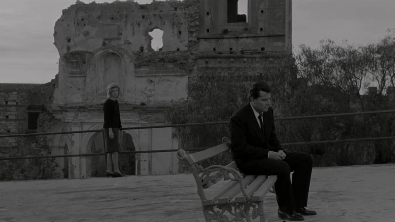 <p>Michelangelo Antonioni can best be described as a mood-driven filmmaker, often eschewing traditional narrative pacing for films focusing on aloofness, characterization, and visual composition.</p><p><em>L’Avventura</em> set off this moodier introspection, providing the template for future tales of isolation and disaffected modernity. The film concerns itself with the disappearance of a young woman during a vacation amidst the Mediterranean, kicking off a search led by her boyfriend and her best friend.  The film, admittedly, may frustrate viewers for its slower pace compared to most films on this list, something <em>L’Avventura</em> itself suffered upon first release.</p><p>However, if one is patient, they’ll find that <em>L’Avventura</em> offers an elegant portrait of disaffected individuals desperately searching for meaning in their lives, be it love or companionship. Antonioni would launch two further films to complete a trilogy speaking to modern culture malaise: 1961’s <em>La Notte</em> and 1962’s <em>L’Eclisse</em>, both highly regarded in modernist cinema.</p>