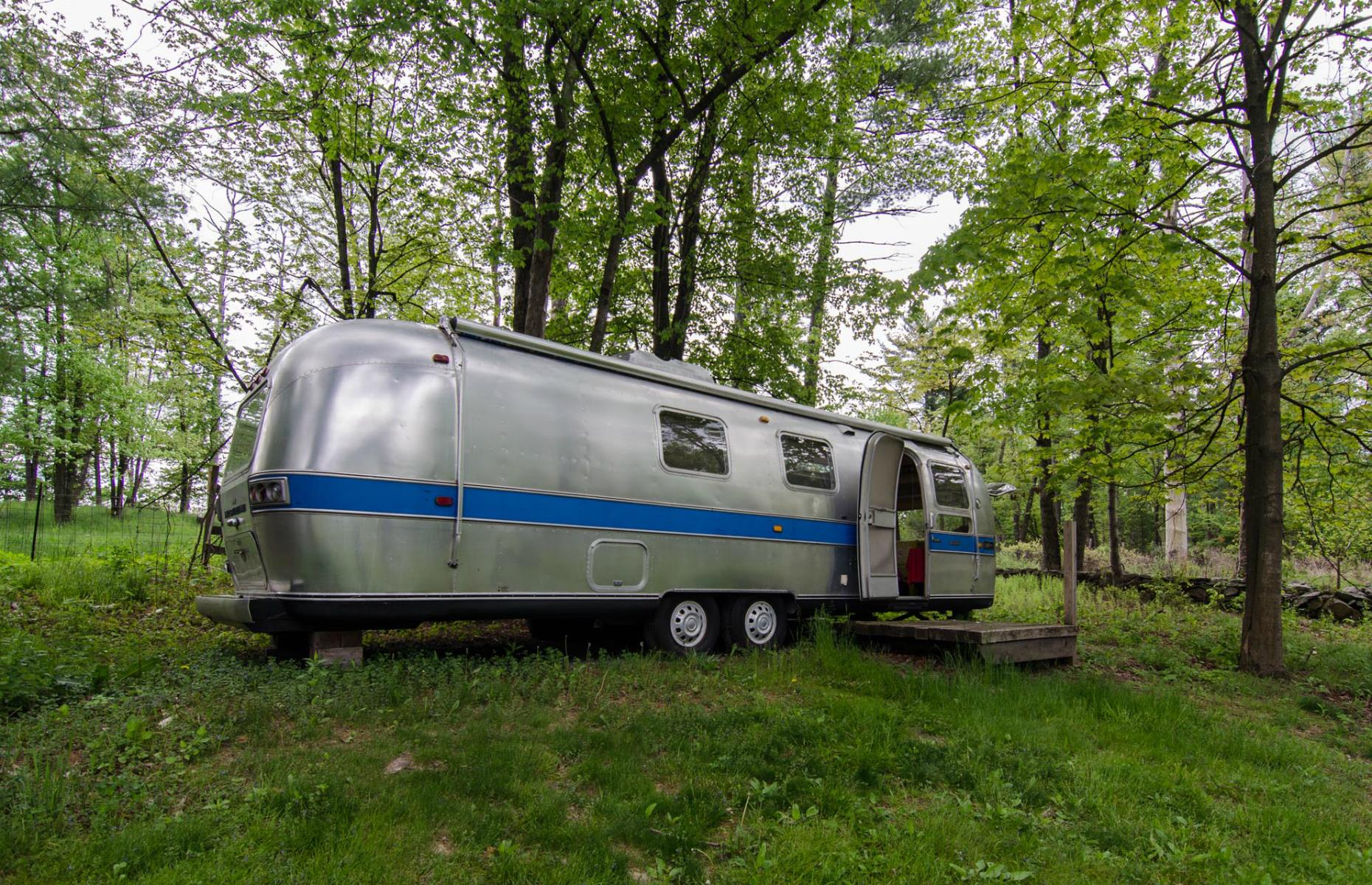 <p>The perfect location for a gathering, this delightful <a href="https://autocamp.com/location/catskills/accommodations/?_accommodations_type=airstreams">Airstream</a> camper sleeps four, plus there’s space for an additional 16 people to sleep comfortably in the adjacent converted barn. It's set on a property with four acres of land, making it the ideal rural retreat.</p>