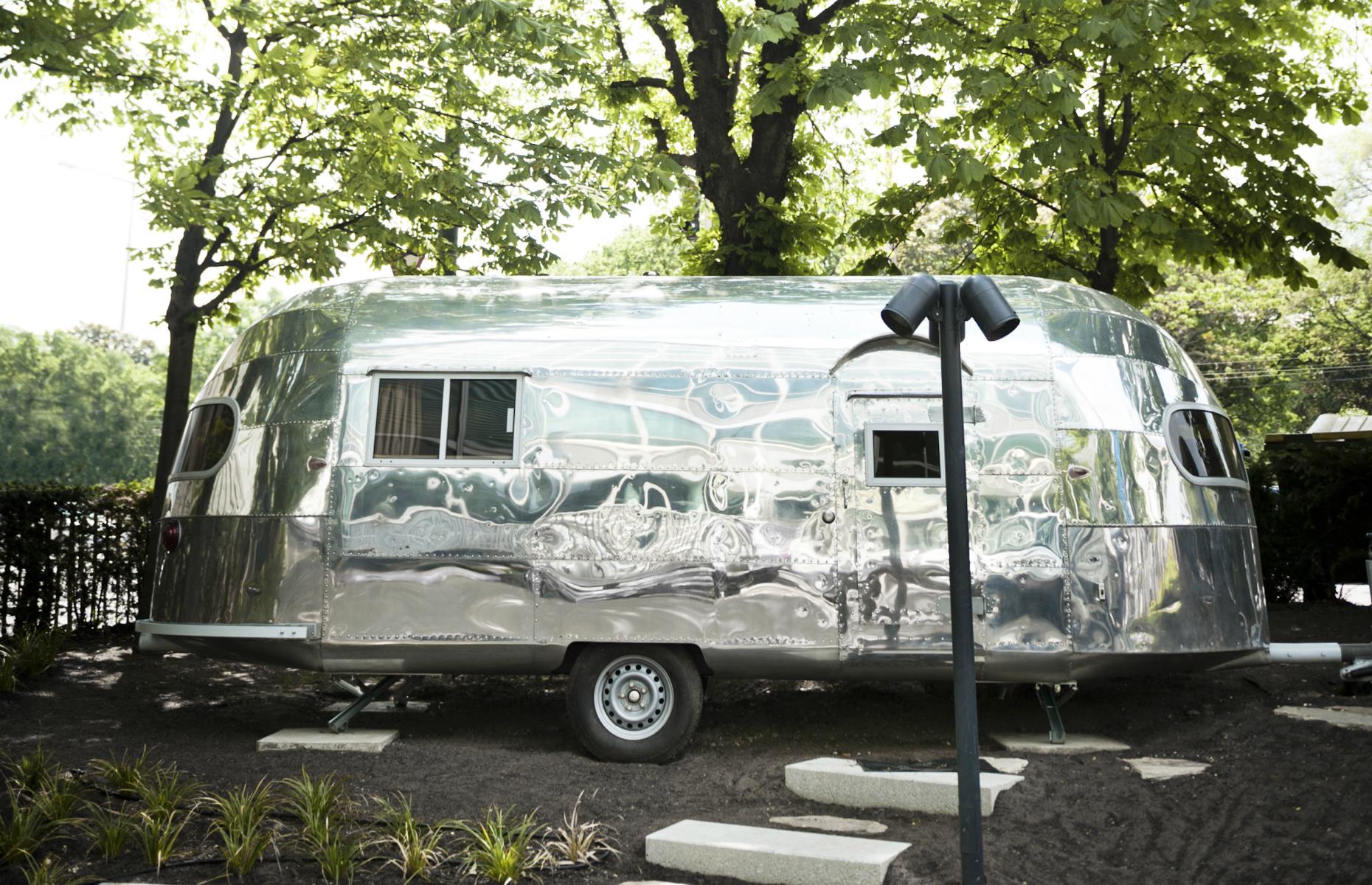 <p>Just 15 minutes from the center of Vienna, <a href="https://hoteldaniel.com/en/vienna/rooms/trailer/">Room 777</a> is a 1952 Airstream with a difference. As well as its location in the grounds of the super-cool Hotel Daniel, this heat and sound-insulated Airstream even has its own free-standing bath. The hotel has its own beehives and bakery too – could it get any trendier?</p>