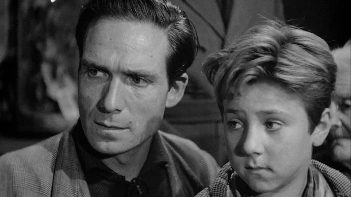 <p>No film has defined the Italian neorealist movement quite like Vittorio de Sica’s devastating <em>Bicycle Thieves</em>. Much like the earlier <em>Rome, Open City</em>, <em>Bicycle Thieves</em> shot almost entirely on-location and employed almost entirely amateur actors, particularly its leading man Lamberto Maggiorani.</p><p>Maggiorani portrays Antonio Ricci, a struggling Roman man who gains employment putting up advertising posters but finds his job at risk when his bicycle is stolen. With his young son Bruno in tow, Ricci scours Rome for his bicycle, ultimately leading to him taking desperate action when all hope seems lost.</p><p>Greeted with warm praise at the time of its release, <em>Bicycle Thieves</em> became the signature film of the Italian neorealist movement. Still celebrated for its downtrodden look at post-war Rome and the tender relationship between its onscreen father and son, the film became a guiding influence for British director Ken Loach and Indian director Satyajit Ray, both of whom would become world-renowned in their own right.</p>