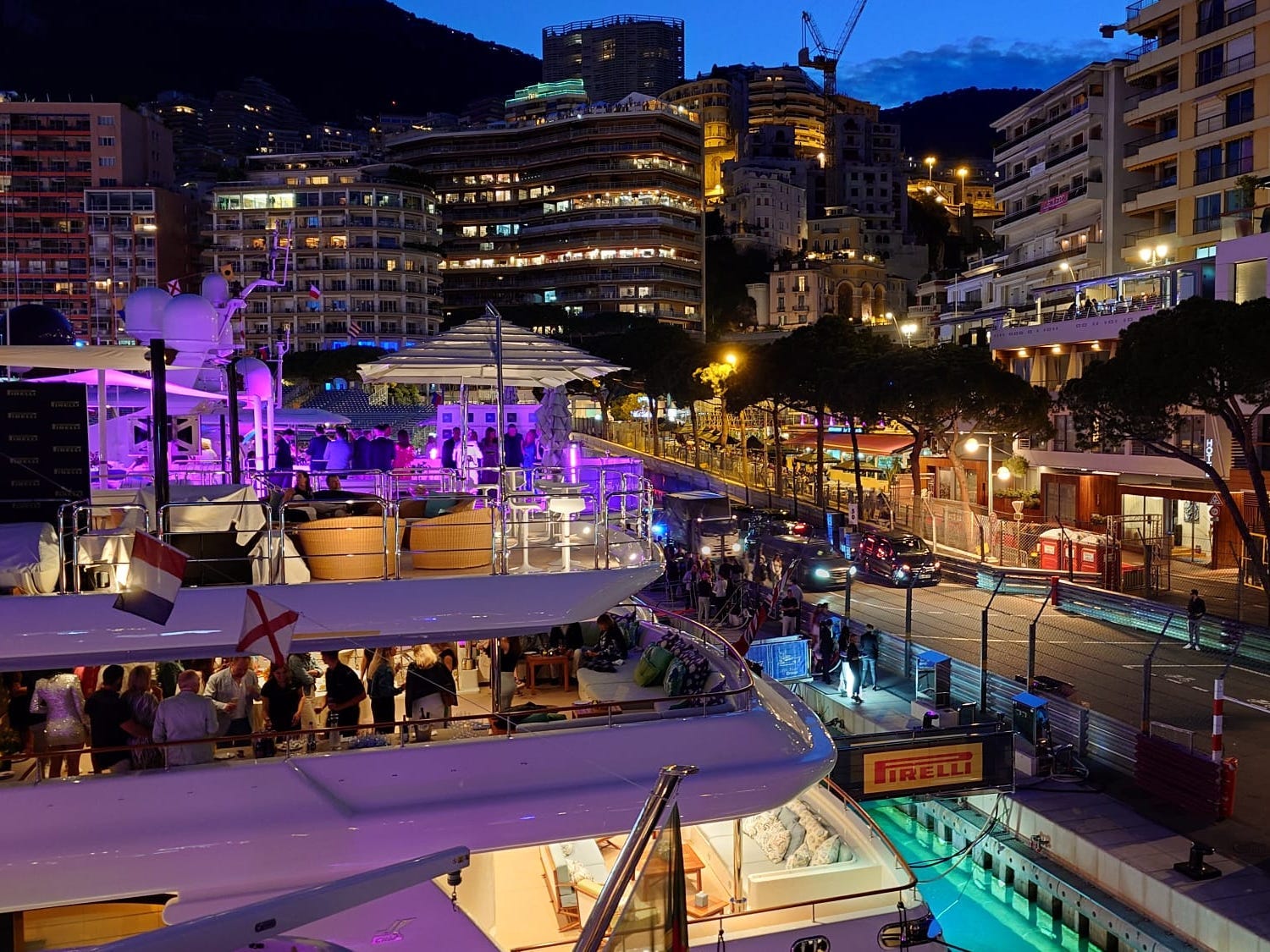 <p>To fully experience the glamorous lifestyle in Monaco, we indulged in a <a href="https://www.businessinsider.com/disney-yacht-club-resort-review-worth-it-photos-solo-traveler-2023-8">yacht party</a> on Friday night. This experience was an add-on to our overall package, and it cost £1,265, or about $1,610.</p><p>We boarded the boat and were greeted with glasses of Champagne. The bottomless drinks and canapés flowed as the onboard DJ pumped music, drowning out the sounds of nearby boats.</p><p>As dusk turned to nightfall, the partygoers seemed to buzz with anticipation for the excitement the weekend had to offer — and we couldn't wait.</p>