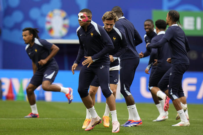 masked mbappé trains for netherlands match at euro 2024, coach optimistic he'll play