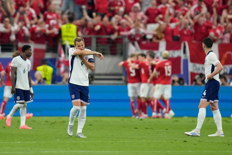 England's Harry Kane reacts after Denmark's Morten Hjulmand scores.