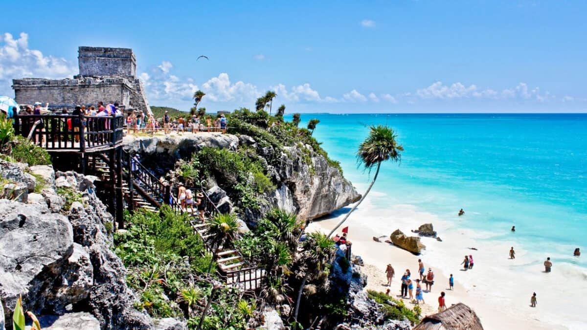 <p>Tulum, situated on the Yucatán Peninsula, is well-known for its beautiful beaches, ancient Mayan ruins, refreshing cenotes, wellness resorts, and lush jungle. If you’re looking for a less-traveled destination that’s becoming more popular, Tulum is a must-see before it becomes too crowded.</p><p>While in Tulum, make sure to visit Chichen Itza, one of the most well-preserved Mayan ruins nearby, and don’t miss out on the amazing Cenote Calavera, where you can swim and enjoy the stunning sinkhole.</p>
