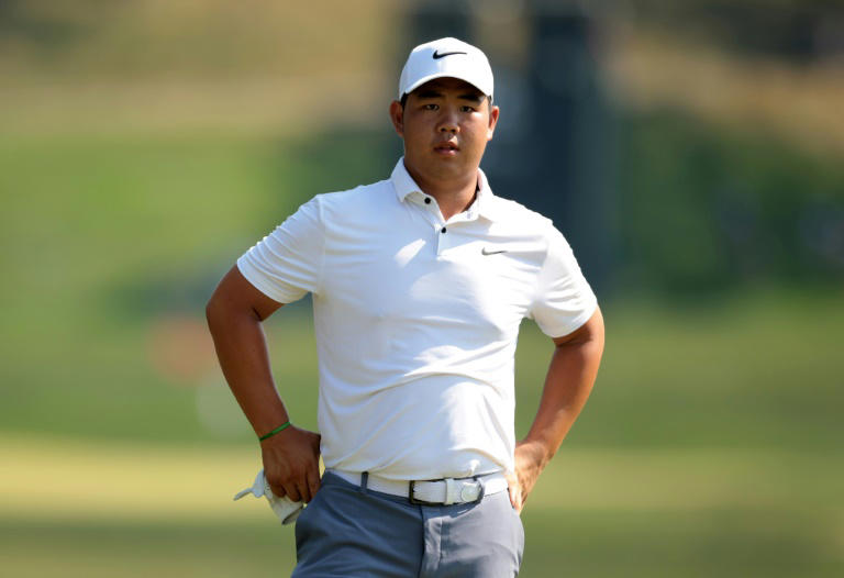 kim closes with back-to-back birdies for pga travelers lead