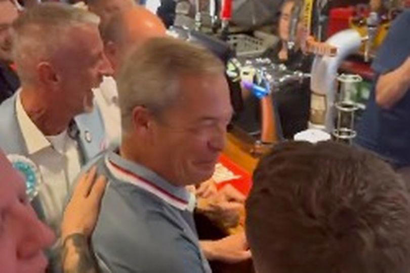 nigel farage's embarrassing own-goal as he downs pint in front of england fans