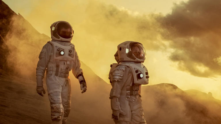 Two Astronauts in Space Suits Confidently Walking on Mars, Explo