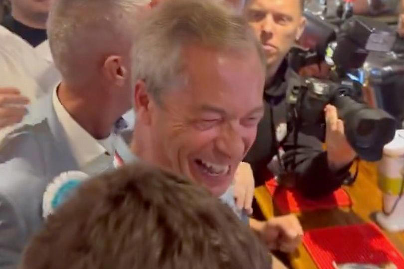 nigel farage's embarrassing own-goal as he downs pint in front of england fans