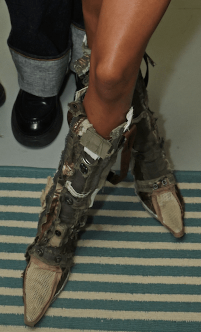 tyla takes the stage in camo patchwork boots while at spotify beach during cannes lions festival