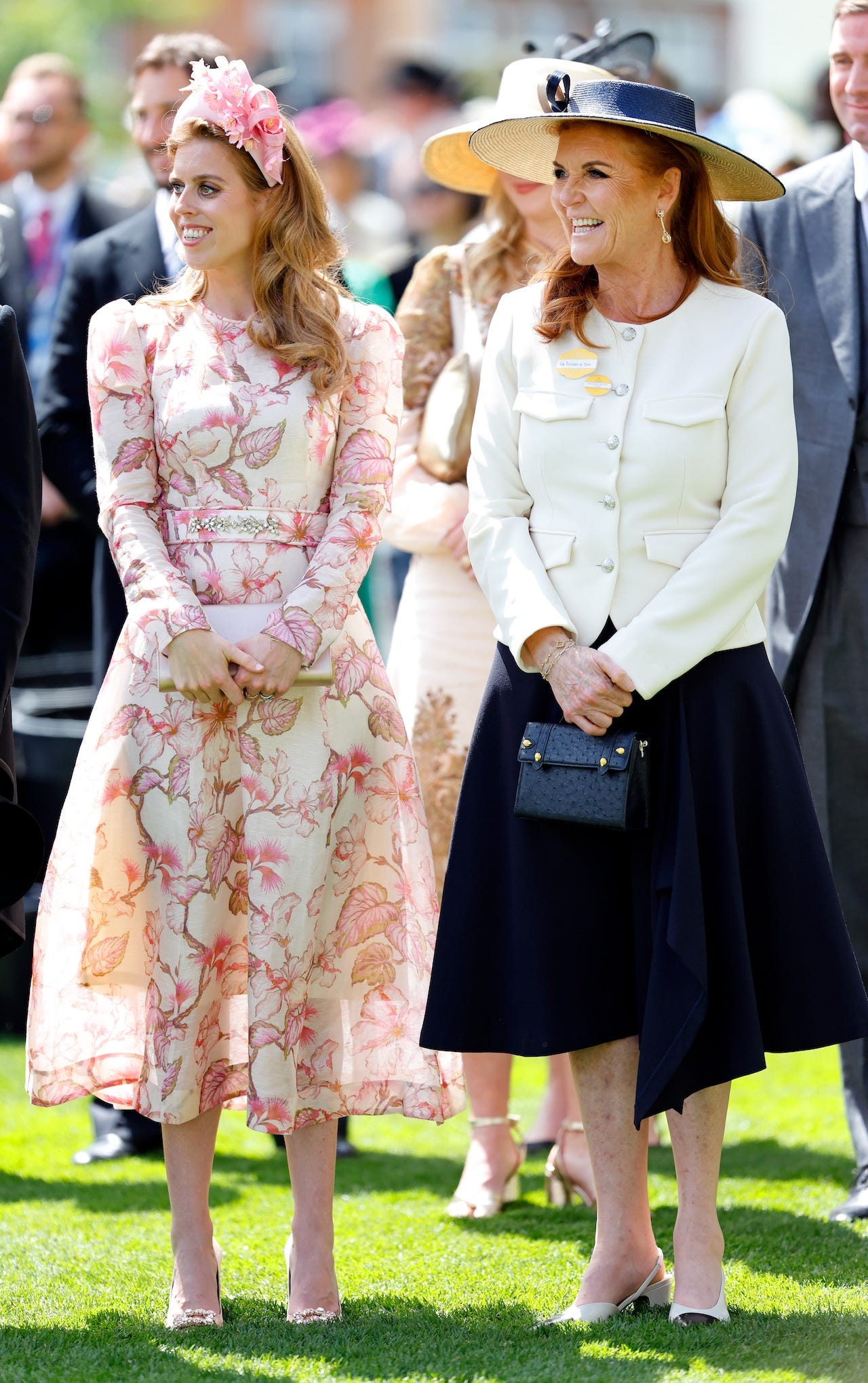<p>Beatrice, 35, arrived at Royal Ascot on day two in an elaborate <a href="https://www.zimmermann.com/us/matchmaker-floral-midi-dress-coral-hibiscus.html">Zimmermann</a> midi dress, dubbed the "Matchmaker." The botanical-printed dress retails for $1,090.</p><p>The lightweight, long-sleeved gown, made from silk organza, featured a diamanté-decorated belt. The princess paired it with a gold clutch and a pink headband with floral pieces designed by Juliette Millinery, <a href="https://wwd.com/pop-culture/celebrity-news/princess-eugenie-dress-beatrice-sarah-ferguson-royal-ascot-1236454367/">WWD reported</a>.</p><p>Beatrice was photographed alongside her mother, the Duchess of York, who wore a navy skirt with a white buttoned-up Veronica Beard blazer.</p>