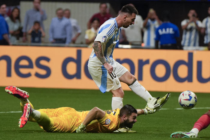 messi and argentina overcome canada and poor surface, start copa america title defense with 2-0 win