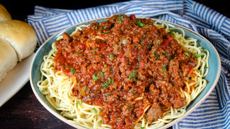 As This Old-fashioned Spaghetti Sauce Simmers On Your Stove All Day It ...