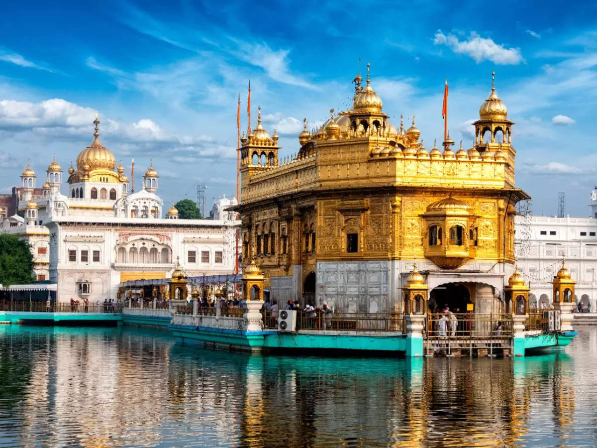 The holiest shrine for Sikhs, the Golden Temple in Amritsar is a magnificent example to Sikh architecture and spiritual significance. The holiest spot within the temple complex, Harmandir Sahib, is entirely covered in gold foil, reflecting the sunlight and earning the temple its famous name. The Golden Temple is a place of peace and inclusivity, where people of all faiths come to pray, meditate, and volunteer in the langar.
