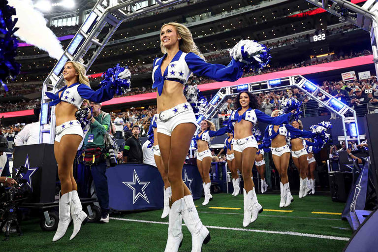 Kevin Sabitus/Getty Dallas Cowboys cheerleaders dance prior to an NFL football game against the Washington Commanders at AT&T Stadium on November 23, 2023 in Arlington, Texas.