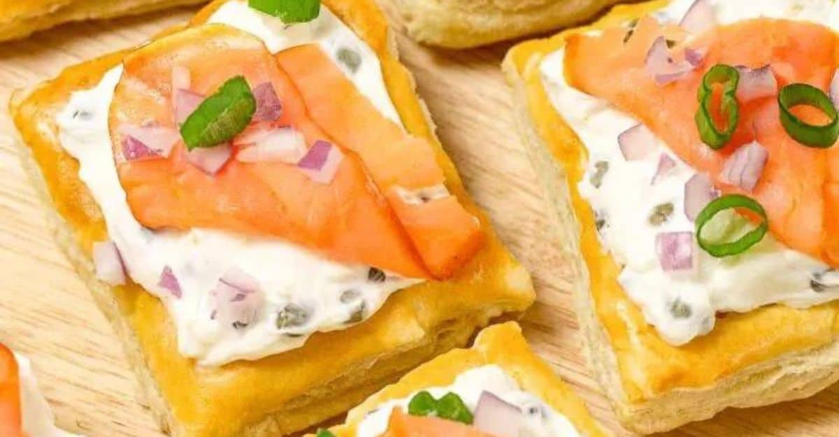 <p>These squares are easy to make. Smoked salmon, flaky buttery puff pastry, and seasoning are all you need to make this delicacy. Lox, with creamy cheese, sliced onion, and capers makes all the difference in this dish.</p> <p>Get the recipe: <a href="https://goodinthesimple.com/puff-pastry-lox-appetizer/?fbclid=IwZXh0bgNhZW0CMTAAAR0YAkHDz4uyUdkcM1CDviG6Lgt1HzPUeAU6Aob6yUk3lHEJ_dIJ_YGHpwk_aem_ZmFrZWR1bW15MTZieXRlcw" rel="noreferrer noopener">Puff pastry lox Appetizer</a></p>