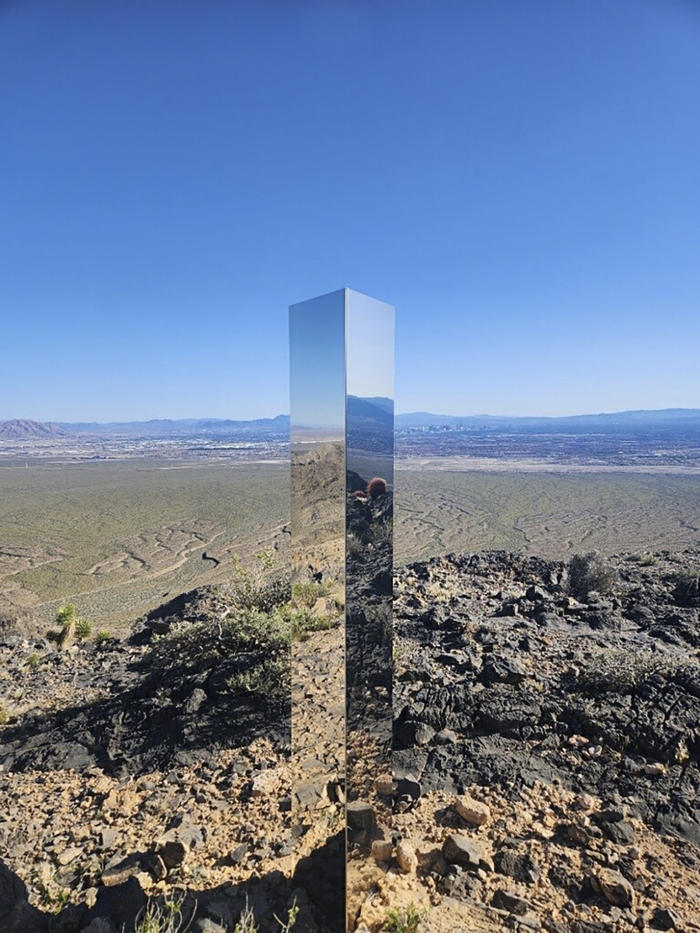 shiny monolith removed from mountains outside las vegas. how it got there is still a mystery