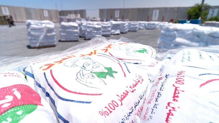 inside gaza aid depot: food waits as israel and un trade blame