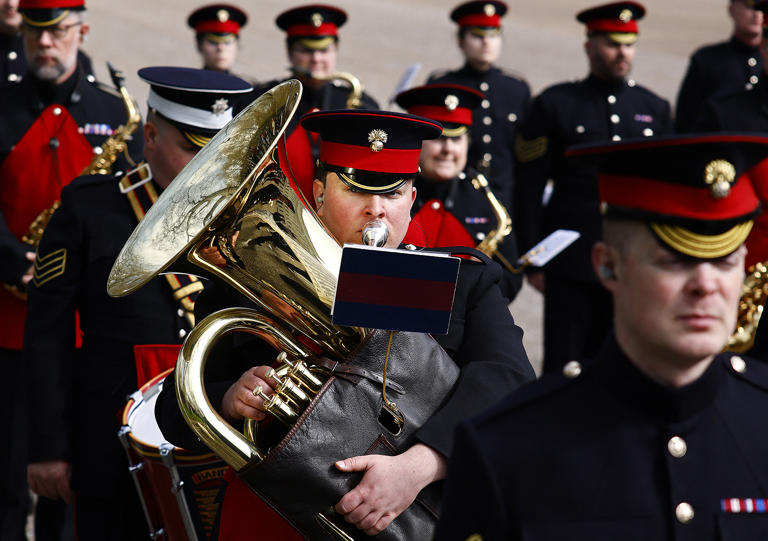 Members of the British Army's Band of the Grenadier Guards take part in a rehearsal for a special Changing of the Guard ceremony, at Wellington Barracks in London on April 5, 2024.