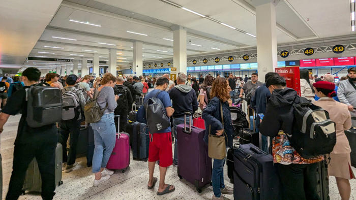 disruption remains at manchester airport after power cut grounded flights
