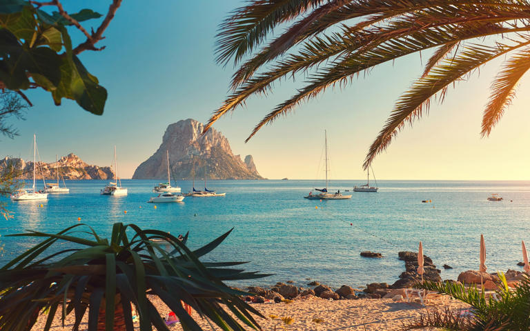Exploring the limestone island of Es Vedra is one of the best things to do in Ibiza
