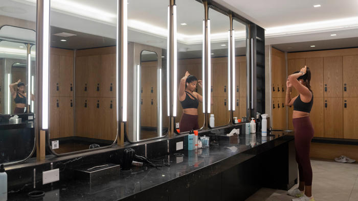 luxury gyms, like equinox and life time, are taking over big retail spaces