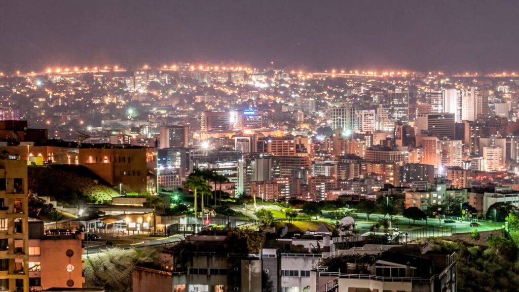 <p>With a death rate of 111.2 per 100,000 people, Caracas in Venezuela is a dangerous place to visit. The city has high levels of chaos and civil unrest, with plenty of kidnapping cases and wrongful detentions.</p><p>To keep safe, avoid traveling to Caracas. With organized gangs running the streets, you can easily get mugged and robbed, which are common in the city. While it seems great to visit Avila Mountain, put your safety first. </p>