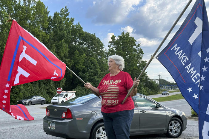 in one affluent atlanta suburb, biden and trump work to win over wary georgia voters