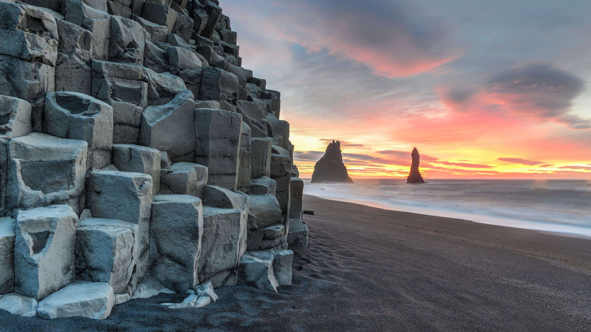 <p>Speaking of black sand beaches, Reynisfjara is the rock star of them all. Famous for its eerie basalt columns that look like nature’s very own Lego set, and <strong>waves so powerful they’ll make you rethink that beach picnic</strong>. This place will blow your flip-flops off (<em>literally, if you aren’t careful!</em>). </p> <p>Keep an eye on the tide while you’re at it—those waves aren’t messing around (seriously, they advise against swimming as you can be swept out to sea). And getting soaked by an Icelandic wave is not the kind of surprise you want in your travel diary. Take your pics fast and run for cover!</p> <div class="wp-block-kadence-iconlist kt-svg-icon-list-items kt-svg-icon-list-items4232_51f27f-9d kt-svg-icon-list-columns-1 alignnone"> <ul class="kt-svg-icon-list"> <li class="wp-block-kadence-listitem kt-svg-icon-list-item-wrap kt-svg-icon-list-item-4232_4b09fc-7c"><span><strong>Best time to visit</strong>: Early morning for the best light and fewer people.</span></li> </ul> </div>