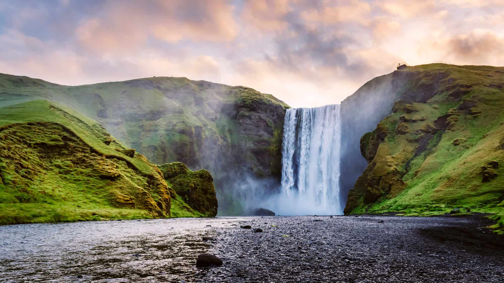 <p>And finally, we can’t forget about Skógafoss, one of Iceland’s legendary waterfalls. This bad boy drops a whopping 200 feet and stretches 80 feet wide—basically, it’s the Arnold Schwarzenegger of waterfalls. </p> <p>The sheer force will blow your mind, and if you’re feeling extra lucky (or just happen to catch the right light), <strong>you might even spot a double rainbow</strong>. Yup, that’s right—two rainbows for the price of one (we know what you’re thinking, and we thought it too). <em>It’s the best kind of BOGO deal. </em></p> <div class="wp-block-kadence-iconlist kt-svg-icon-list-items kt-svg-icon-list-items4232_b6d6b5-24 kt-svg-icon-list-columns-1 alignnone"> <ul class="kt-svg-icon-list"> <li class="wp-block-kadence-listitem kt-svg-icon-list-item-wrap kt-svg-icon-list-item-4232_3e625a-6d"><span><strong>Best time to visit</strong>: Early morning or late afternoon to catch the rainbows.</span></li> </ul> </div>  <div class="wp-block-kadence-iconlist kt-svg-icon-list-items kt-svg-icon-list-items4232_027a7c-85 kt-svg-icon-list-columns-1 alignnone"> <ul class="kt-svg-icon-list"> <li class="wp-block-kadence-listitem kt-svg-icon-list-item-wrap kt-svg-icon-list-item-4232_f77347-4a"><span><strong>Discover More:</strong> <em>Sure, Iceland’s Northern Lights are cool and all, but did you know there are other places with equally dazzling celestial shows? <a href="https://discoverparksandwildlife.com/missed-the-northern-lights-last-week-here-are-6-national-parks-where-you-have-a-chance-to-spot-them/">Check out our list of national parks where you have a good chance of spotting them on your visit</a>. </em></span></li> </ul> </div>