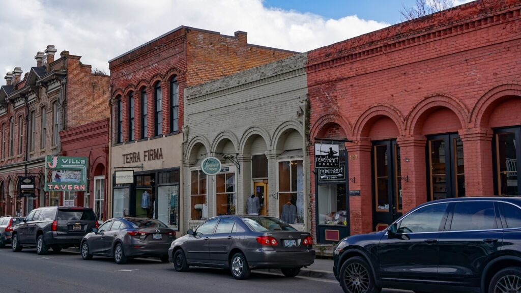 <p>Just outside of Medford sits one of Oregon’s most underrated towns – <a href="https://roamthenorthwest.com/adorable-small-oregon-towns/">Jacksonville</a>. As soon as you arrive in this historic town you’ll feel like you’ve been transported back in time with its well maintained 19th-century architecture lining the downtown core.</p><p>We recommend spending an afternoon wandering through downtown and visiting its numerous boutiques, cafes, and wine-tasting rooms.</p><p>If you’re looking for a more in-depth tour of the town, then check out the trolley tours, which run on the hour from late spring through mid-fall.</p>