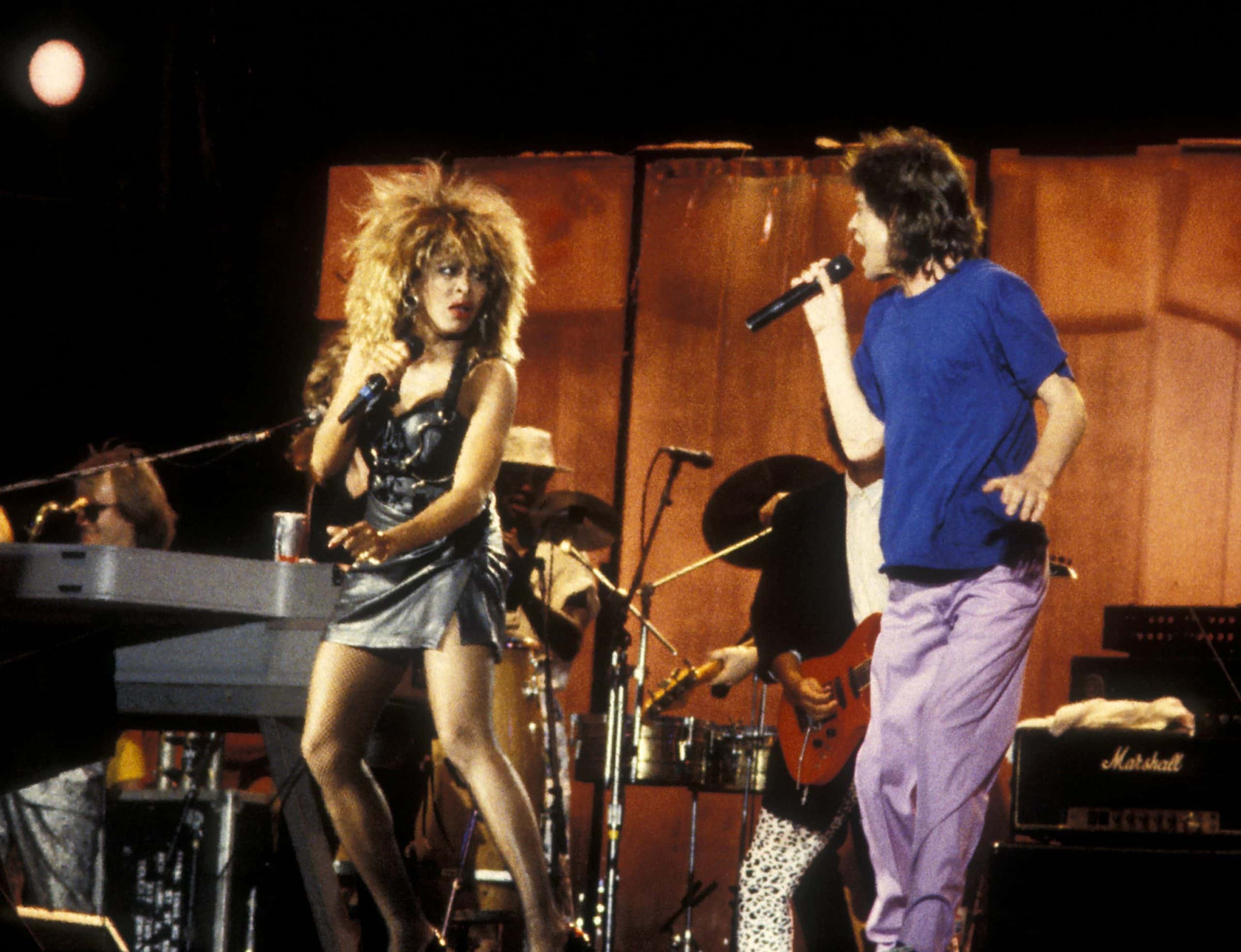 <p>Long before Justin Timberlake and Janet Jackson’s Super Bowl infamy, <strong>Tina made scandalous headlines</strong> <strong>of her own.</strong> In 1985, she performed for the global mega-concert Live Aid. She was singing with Mick Jagger of the Rolling Stones when Jagger ripped off his own shirt and then danced up to Tina and yanked her skirt off. She performed the rest of the song in a black leotard.</p>