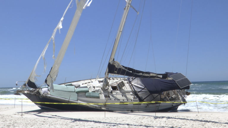 Sailboat washes up on Pensacola Beach after men onboard were rescued south of Panama City
