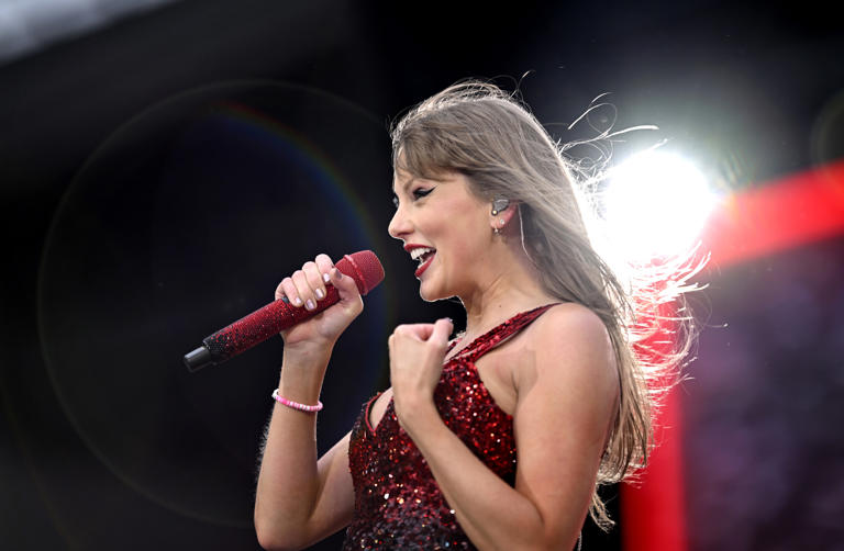 Taylor Swift performs on stage during "Taylor Swift | The Eras Tour" at Anfield on June 13, 2024 in Liverpool, England. Ten days later, boyfriend Travis Kelce joined her on stage in London — and her reaction was the best.