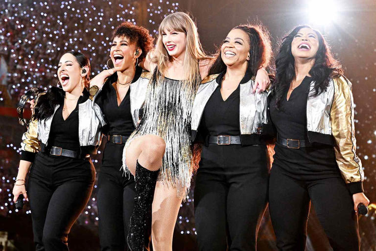 Shirlaine Forrest/TAS24/Getty Taylor Swift with her backup singers performing in Cardiff on June 18, 2024
