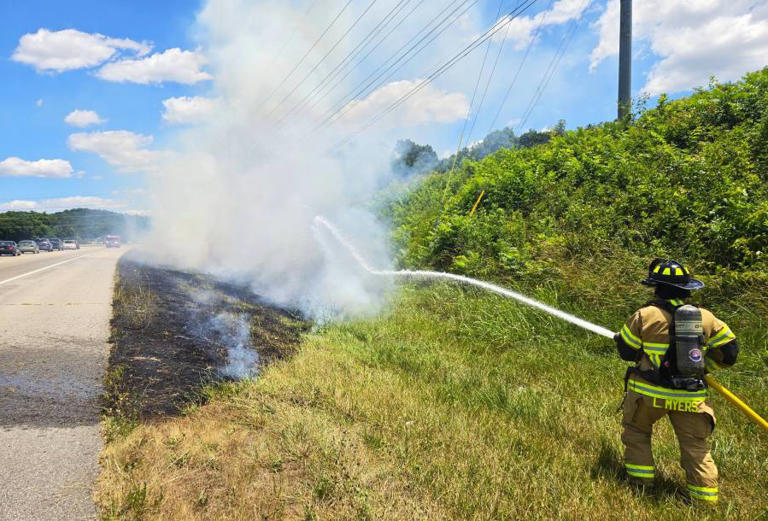 PHOTOS: 300-ft. ditch fire burns on West Andrew Johnson Highway amid ...