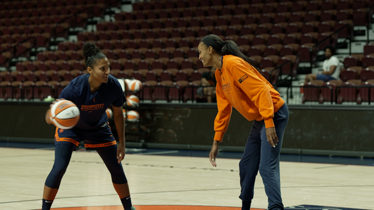 Alyssa Thomas and DeWanna Bonner play a competitive game of one on one at Mohegan Sun Arena, home of the Connecticut Sun.  / Credit: CBS News