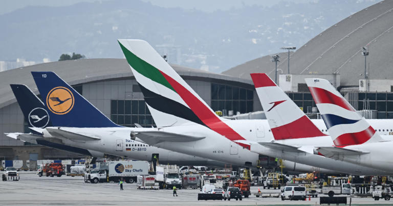 Ground crews load cargo and supplies onto airplanes from airlines including Lufthansa Group, Emirates, Austrian Airlines, and British Airways, as they stand parked at the Tom Bradley International Terminal (TBIT) at Los Angeles International Airport (LAX) in El Segundo, California, on September 11, 2023.