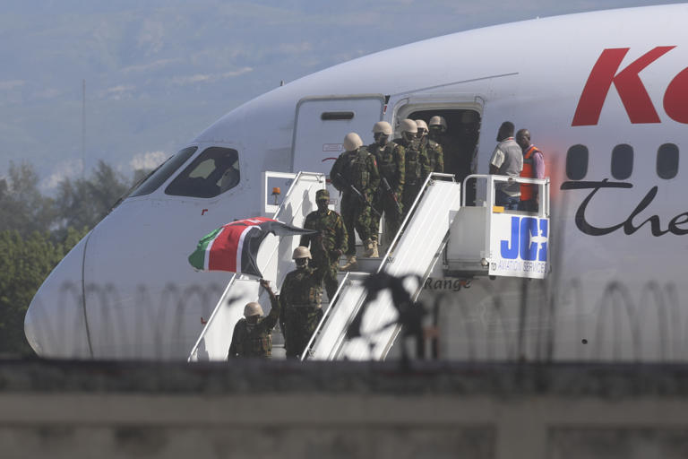 UN-backed contingent of foreign police arrives in Haiti as ...