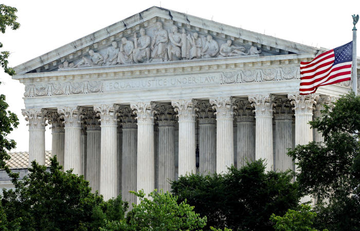 justice department urges supreme court to decide if felons can be barred from having a gun