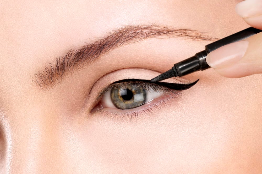 <p>I don’t take eyeliner with me in my travel case. I don’t see the need for it. If I want to do something like a small winged liner, I can use a dark brown shadow with a little angled brush, or I can use my soft black eyebrow pencil.</p><p>If you wear eyeliner every day and can’t be without it, these are a few I love to use in my daily life.</p><p><strong>The Maybelline Tattoo Studios Liner</strong></p><p>If you are new to liner and want something that is really easy to clean up if you ruin your line (and I ruin my own all the time!) this is the one for you.</p><p><strong>The KVD Tattoo Liner</strong></p><p>I love the brush head on this liner. It doesn’t feather into eye wrinkles and it stays put all day. (It does leak when it travels–all liquid liners do because of the change in pressure. If you really want a liquid liner, just pack some extra wipes to clean it up.)</p>