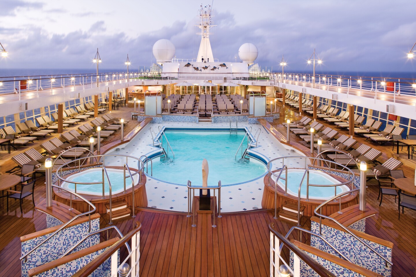<a>Imagine a calm and quiet pool deck like the one aboard the Seven Seas Voyager.</a>