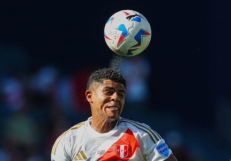 soccer-assistant referee faints in peru v canada copa america clash